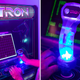 Image for article titled Ditch Your Sofa to Make Room for These Ridge Racer and Tron Arcade Machines